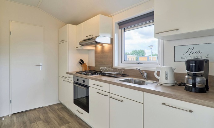 Suesel House | Detached vacation home Wellenkönig in Süsel with terrace by the lake and WLAN