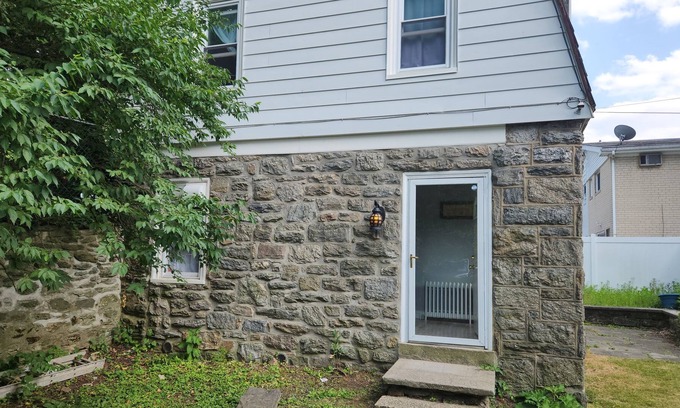 Elkins Park House | Discover the allure of a 2BR, 1.5B house in the secure embrace of historic Elkins Park