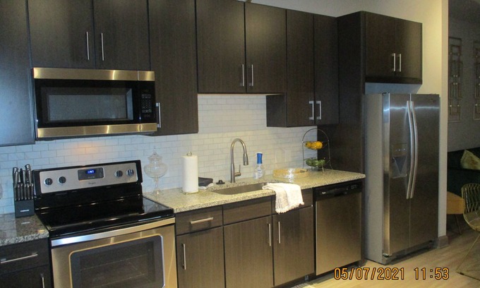 Atlantic Station Area Condo | Discover the best of Atlanta with views overlooking the Midtown area.