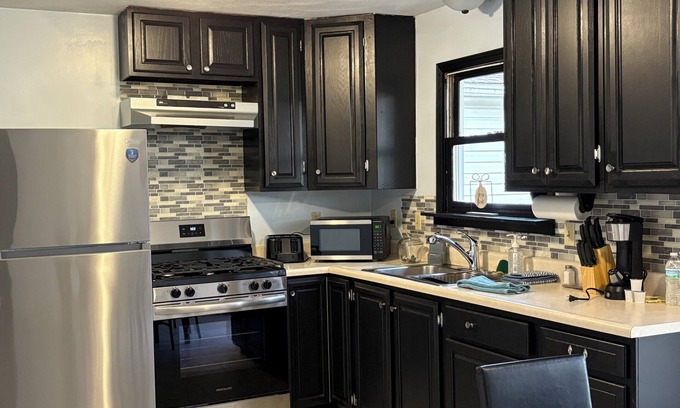 Vestal House | Discover your family's perfect retreat in Vestal with this cozy brick house!