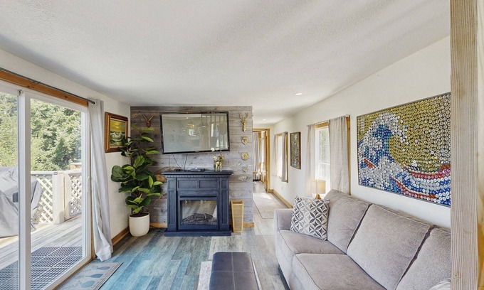 Port Orford Cabin | Dog-friendly cabin tucked Into the trees with WiFi, washer/dryer, & ocean views