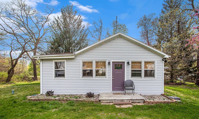 Lake Michigan Beach Cottage | Dog-friendly cottage with a large yard, firepit, grill, & wood-burning fireplace