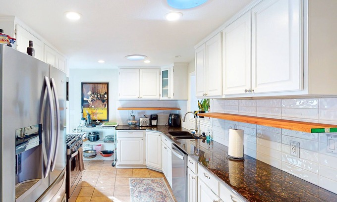 Englewood House | Dog-friendly home near Red Rocks with game room, deck, grill, & firepit