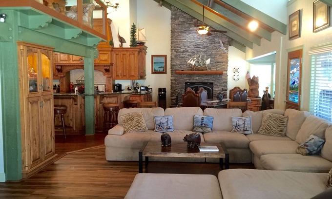 Bass Lake House | Dog-friendly, lake view home with a boat slip, three decks, fireplace & WiFi