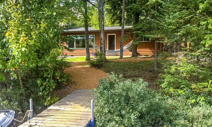 Presque Isle House | Dog-friendly lakefront cabin w/wood fireplace, patio & firepit - kayaks & canoe!