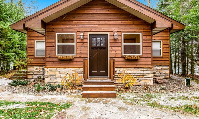 Arbor Vitae House | Dog-friendly lakefront home - dock, private sauna, fireplace & fiber optic WiFi