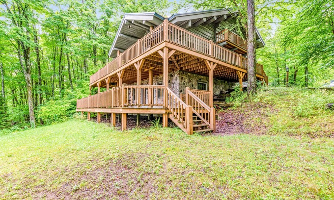 Presque Isle House | Dog-friendly, lakefront home with a wood fireplace, decks, dock, & AC