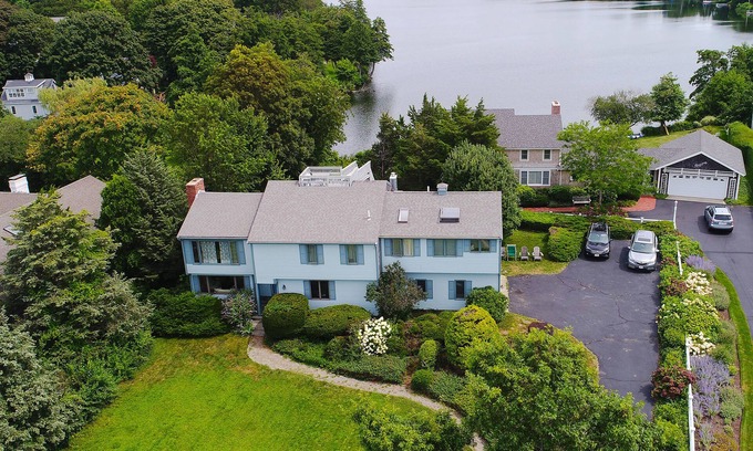 Falmouth House | Dog-friendly, lakefront home with roof deck - blocks from the beach