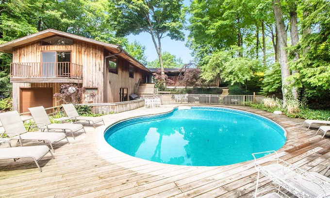 Harbert House | Dog-friendly lakefront house with private hot tub, outdoor pool, beach, WiFi