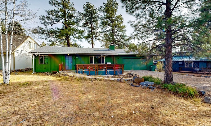Munds Park House | Dog-friendly rustic retreat with enclosed yard, grill, wood stove, games, & W/D
