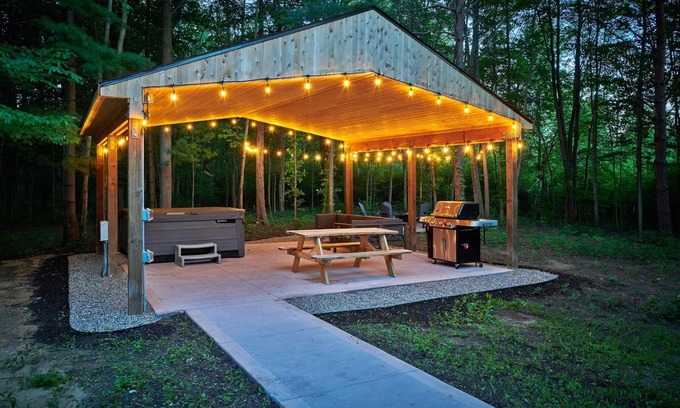 Fennville House | DollyBrook 9: Relax in your private hot tub or jump in the association pool