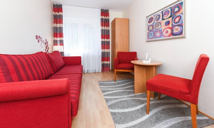 Esens Cottage | Doppelzimmer Helgoland - Pension Nordkap in Bensersiel