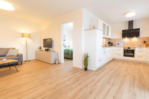 Dorumer Neufeld Apartment | Dorumer Sielhuus 4 - Ferienwohnung mit Garten und Sauna
