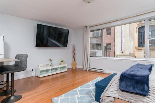 Theatre District Apartment | Downtown Boston Studio Central Location Famous Nightlife Chinatown with Bed Full of Promises!