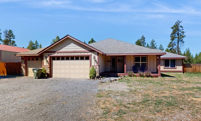 Three Rivers House | Dreamy getaway near river with hot tub, lush property, fire pit, grill & WiFi