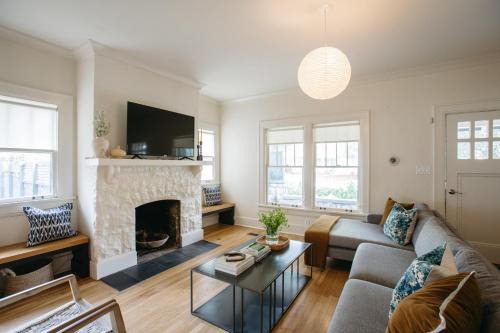 Eastwood House | East Nashville Retreat w Fireplace Backyard Firepit Outdoor Dining Minutes from Downtown Music Food Nightlife Chapel House by AvantStay