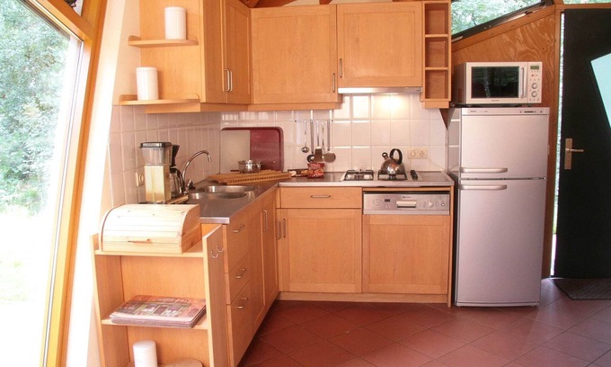 Herpen House | Eco holiday home with wood stove, in a holiday park in the middle of nature