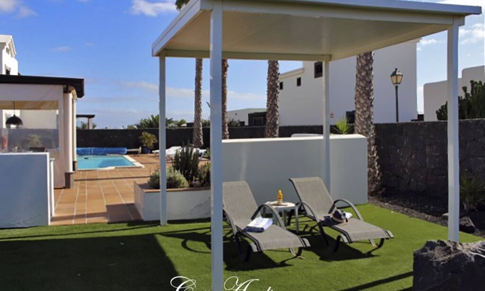 Playa Blanca Villa | Elegant Detached Villa: Private Heated Pool, Free Wifi, BBQ & Beatiful Garden