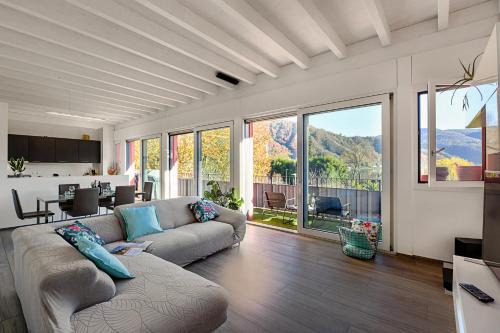 Caslano Apartment | Elegant Lugano Lake View - Happy Rentals
