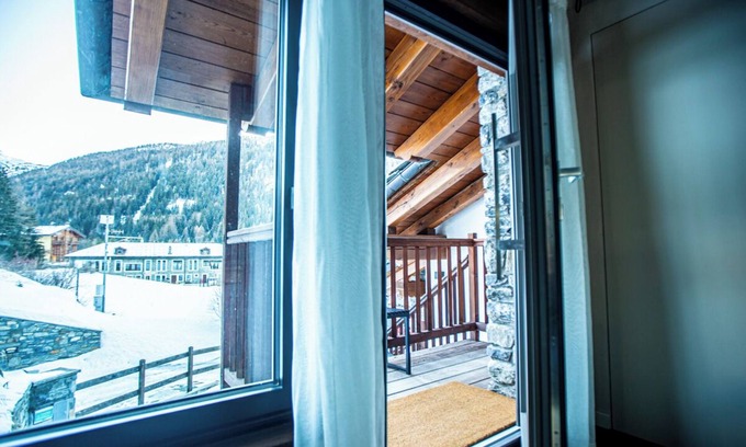 La Thuile Apartment | Elegant mountain vacation home located within walking distance of ski facilities