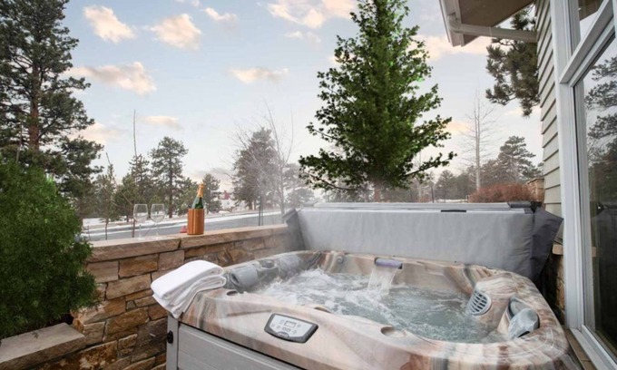 Stanley Hills Condo | Enchanting condo with fireplace, patio, and private hot tub!