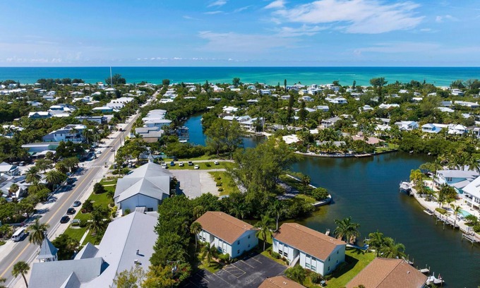 Anna Maria Condo | Endless Summer- On Pine Ave, steps to beach & pier w/water view & dock