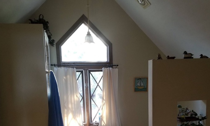 Higgins Lake House | English Cottage Lakefront House with Beautiful Sunsets