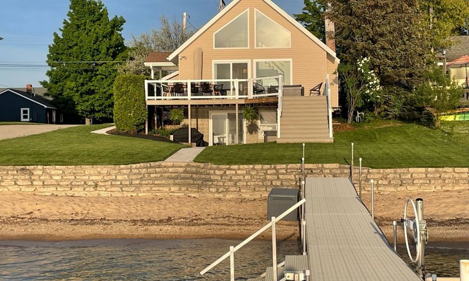Beulah House | Enjoy Crystal Lake's pristine water and amazing sunsets from this lakefront home