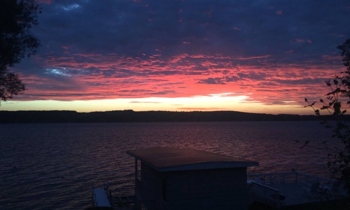 Skaneateles House | Enjoy east side sunsets in elegant, lakeside home with boathouse