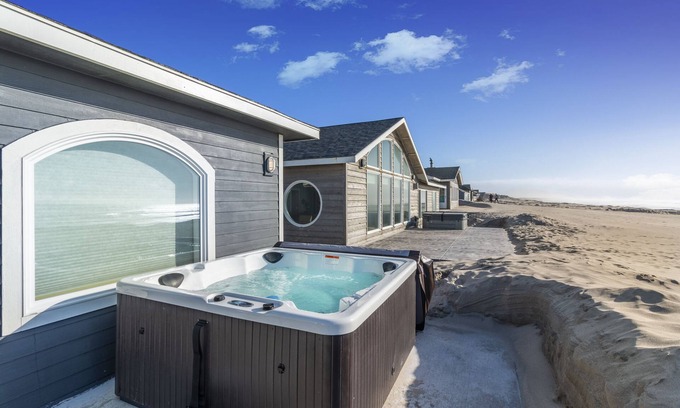 Kiwanda Shores House | Enjoy surf or sunset in the Hot Tub at this Beachfront Home in a Gated Community