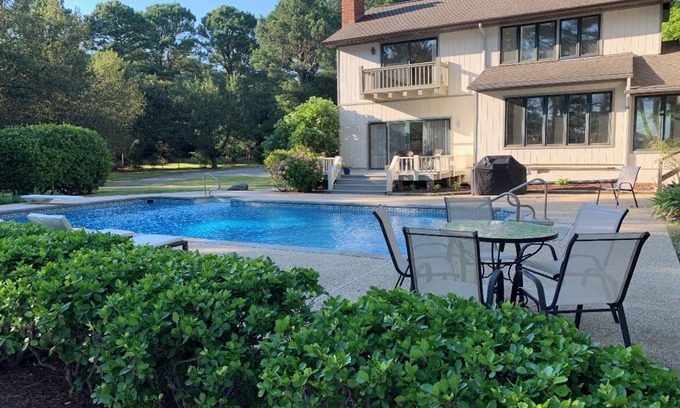 Bozman House | Enjoy the beautiful reflections of sunsets and the golden leaves on the water!