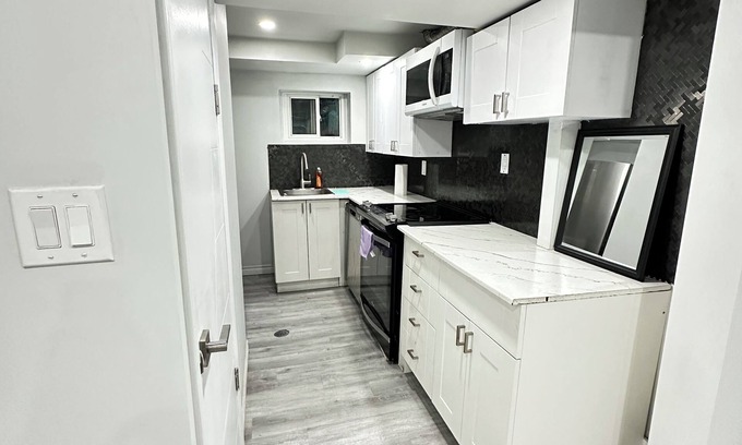 Kitchener House | Entire 2 Bedroom lower Unit, Kitchen+Wi-Fi+Laundry+Parking+Ventilated+Well Lit