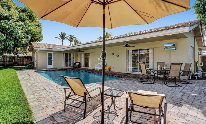 Coral Ridge Isles House | Entire house with heated pool and great backyard 1.5 miles from beach.