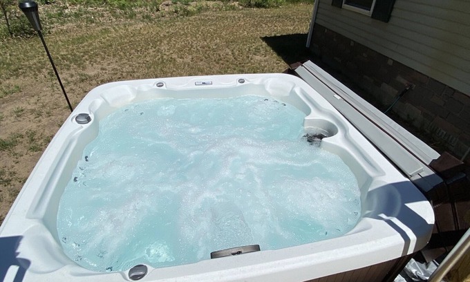 Manistee House | Escape to Northern Michigan! Private, secluded with spa. ORV/snowmobile trail.