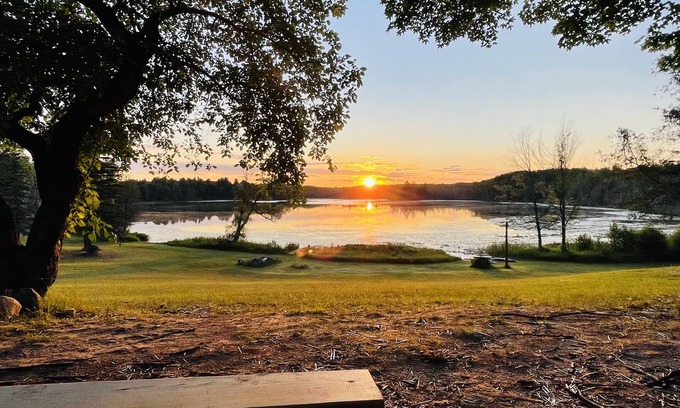 South Boardman Cabin | Escape to Serenity: Private Lake and Cozy Cabins for Rent