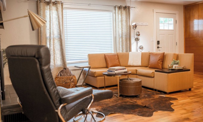 Phoenix House | Escape to this artsy 2-bedroom MCM Guesthouse in charming Phoenix, OR. Unwind in the luxurious spa soaking tub after exploring Southern Oregon. Features high-end design for a stylish, quiet retreat.