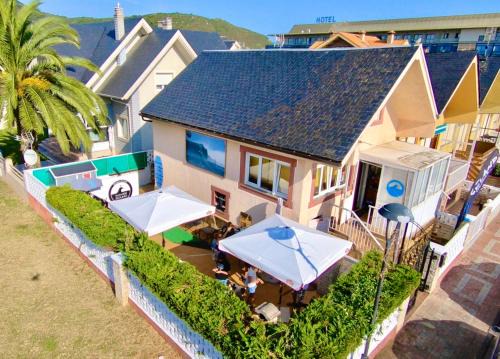 Santona House | Escuela de Surf WAVES SOUND - Alojamiento Compartido