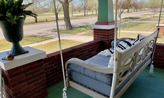 Wichita House | Esmeralda on the Green, golf course views from darling porch with daybed swing!