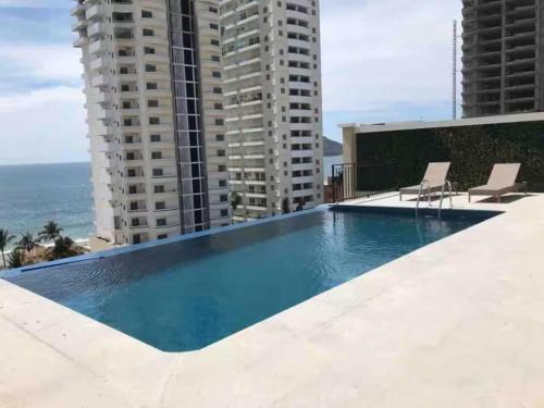 Zona Dorada Apartment | Espectacular condo en Blue Marlin Zona Dorada Beach