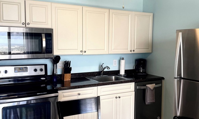 South Island Condo | Estero Beach & Tennis Club by Check In Vacation Rentals