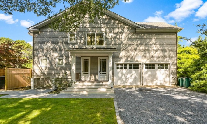 Wainscott Woods House | Exceptional shingle-style home sited on just under an acre of land,.