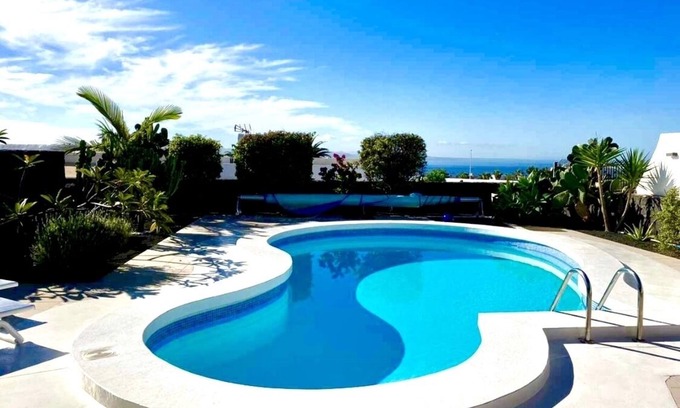 Playa Blanca Villa | Exclusive location, Playa Blanca, heated pool, sea views, near the beach, WiFi