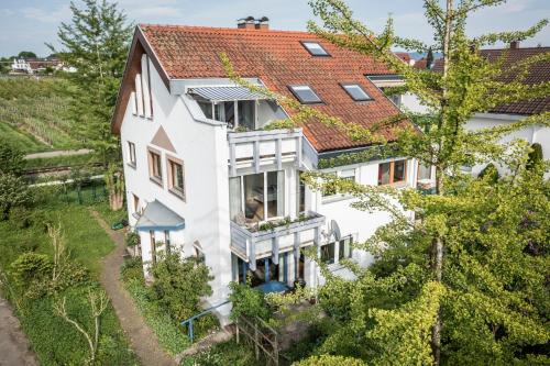 Nonnenhorn House | Exklusives Josenhaus mit See- und Alpenblick & Gartensauna
