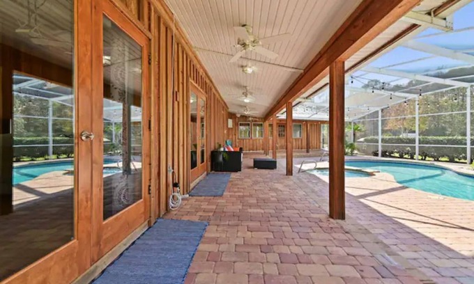 St. Cloud House | Experience FL in a Cypress Cabin w/Pool & Theater