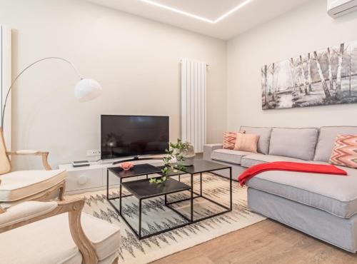 Justicia Apartment | Experience the best of Madrid! Gran Vía Apartment for 6, comfort and style in the heart of Chueca III