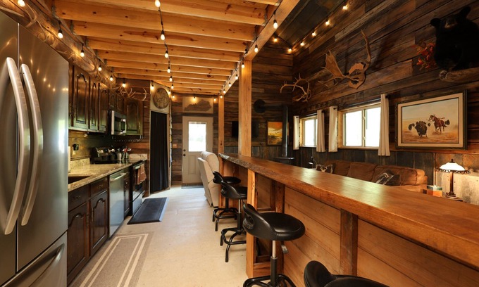 Campton Cabin | Experience the serene beauty of Campton, KY in the cozy 2-bedroom, 1-bathroom Wolf Pen cabin