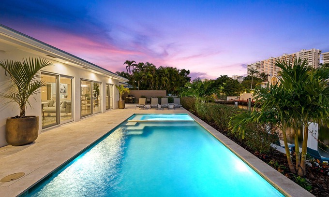 Bermuda Riviera House | Experience the Florida Sun at Beach Bunny, a Sunny Private Heated Pool Getaway!