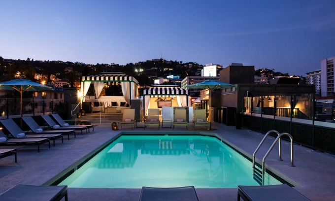 Norma Triangle Apartment | Explore Three Luxurious Suite with Living Spaces, Balconies and Rooftop Pool!