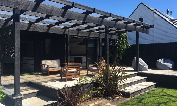 Omanu House | Fabulous bach with large secluded sunny backyard just minutes from beach