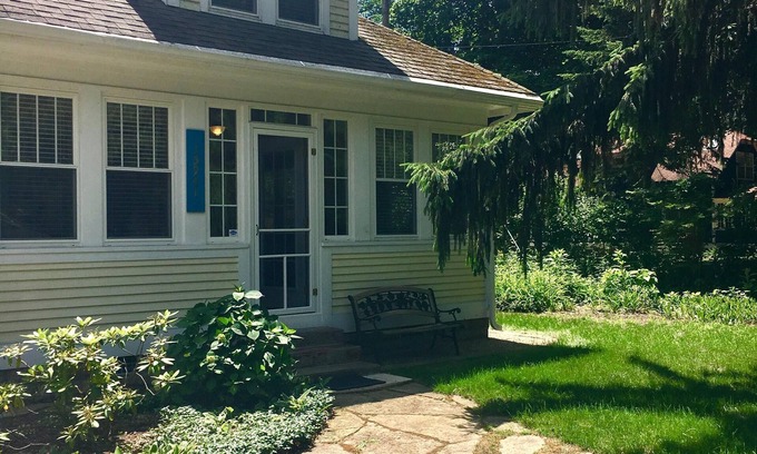 Union Pier Cottage | Fall splendor steps to the beach. Large screened porch,fire pit beautiful yard.